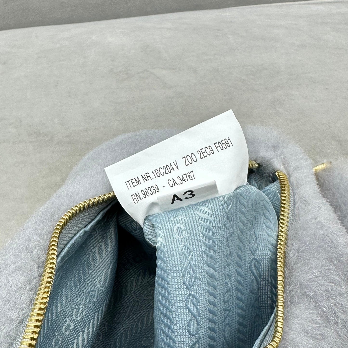 PRADA Re-Edition 2005 shearling shoulder bag