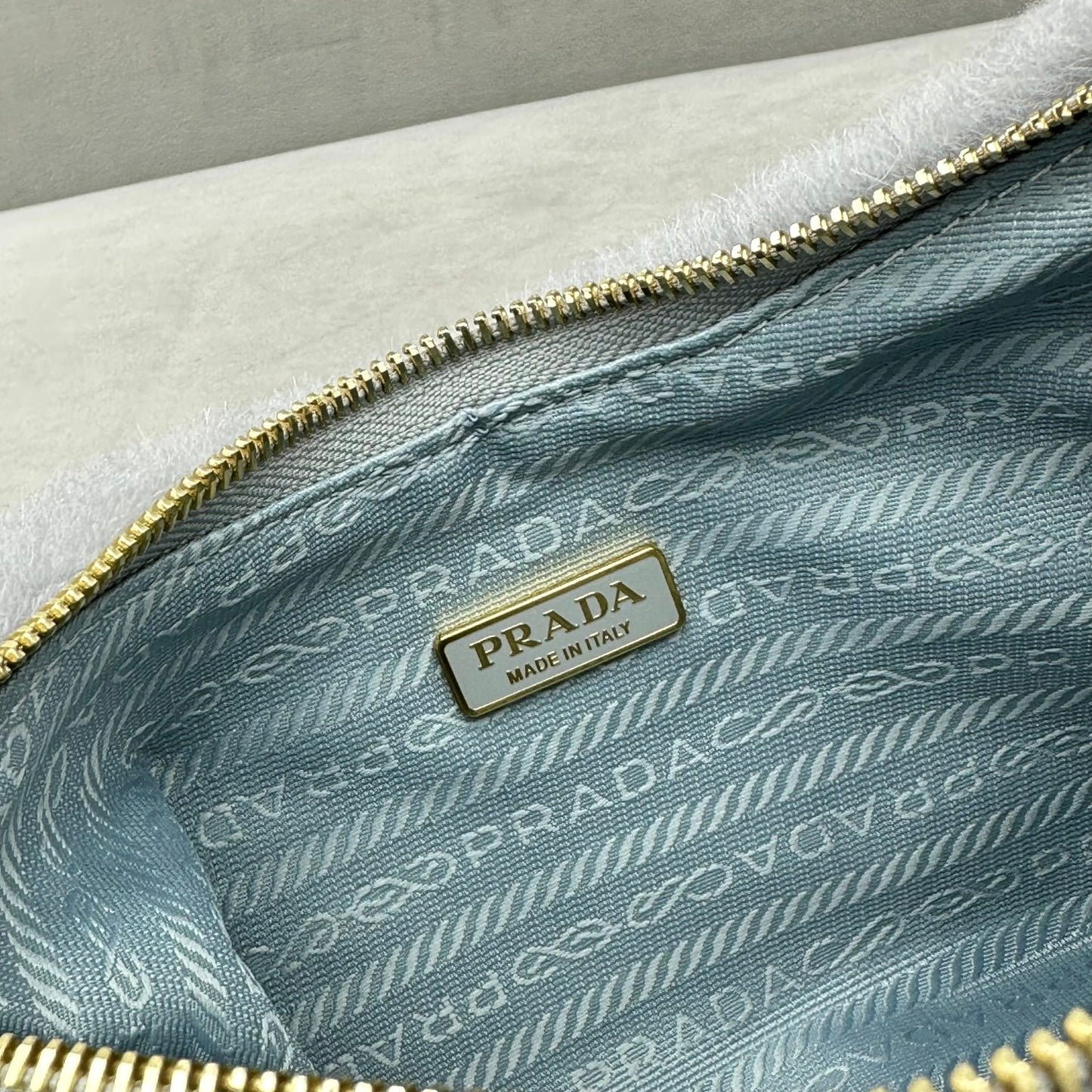PRADA Re-Edition 2005 shearling shoulder bag